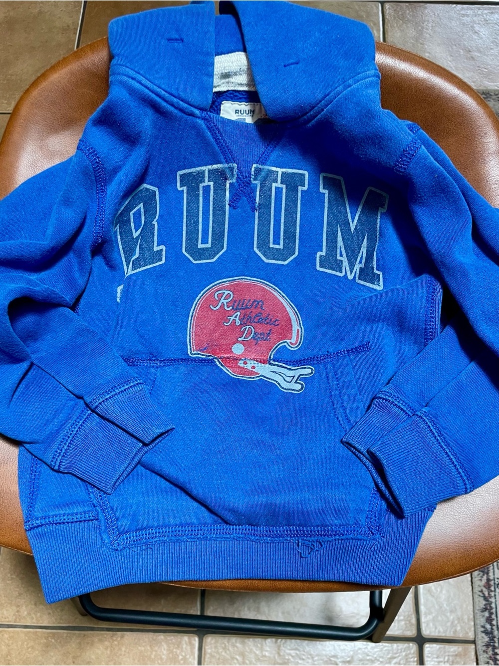 Ruum Bright Blue Hoodie with Red Helmet Graphic